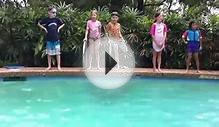 Kids jumping in the pool