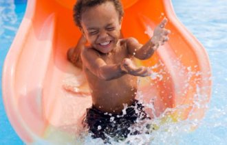 Young man on waterslide